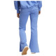 Adidas Γυναικείο παντελόνι φόρμας All SZN Soft Lux Flared Pants